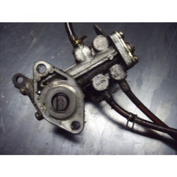 87 1987 POLARIS INDY 650 TRIPLE SNOWMOBILE ENGINE PUMP OIL INJECTION INJECTOR #3 image