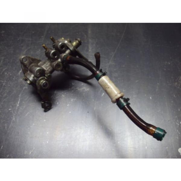 87 1987 INDY 650 POLARIS TRIPLE SNOWMOBILE INJECTION OIL PUMP INJECTOR #1 image