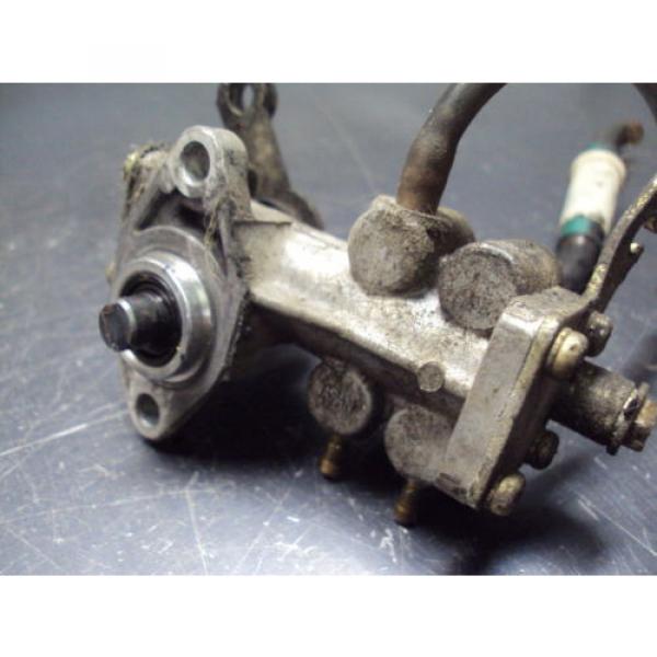 87 1987 INDY 650 POLARIS TRIPLE SNOWMOBILE INJECTION OIL PUMP INJECTOR #3 image